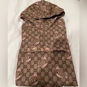 Gucci Rain poncho, pouch pocket, gold snaps on sides